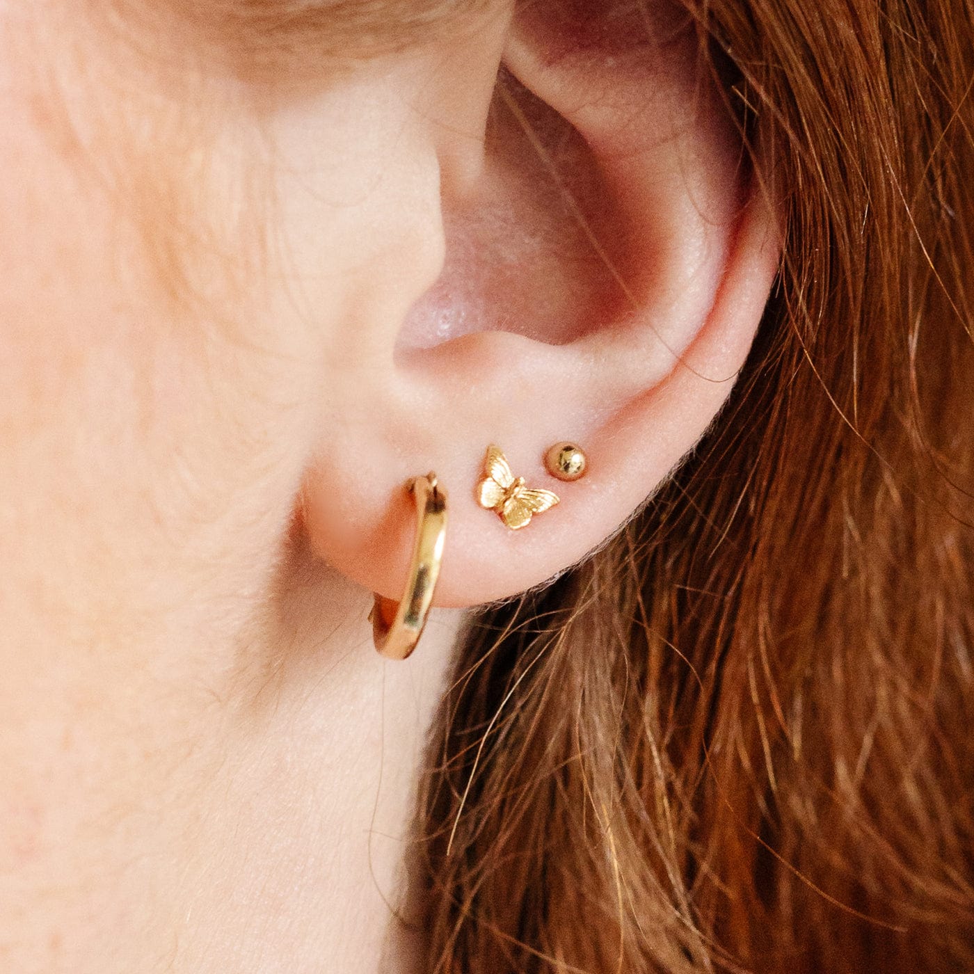 https://www.madebymary.com/cdn/shop/files/butterfly-stud-earrings-gold-vermeil-earring-29568788725833.jpg?v=1691840526&width=1400