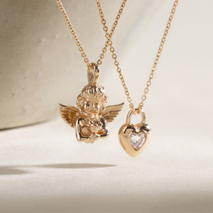 Layers of Love charm necklace flatlay